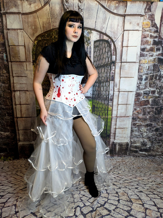 Unterbrustkorsett blutig